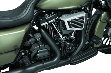 Motorcycle engine with Kuryakyn Precision Tappet Block Accent Black 6440