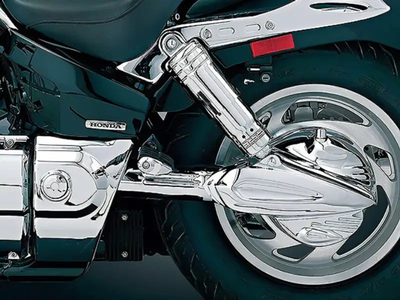 Chrome motorcycle suspension and wheel with Kuryakyn Precision Tranny Shroud Chrome