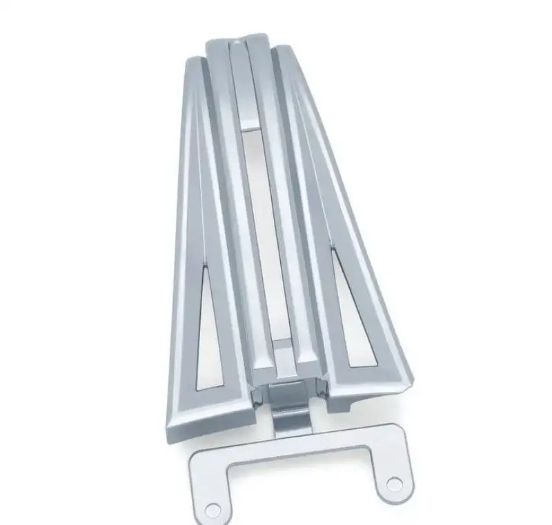 Silver metal grill component for Kuryakyn Precision Upper Frame Cover Chrome