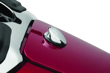 Kuryakyn Quick Release Fuel Door Knob Chrome on red motorcycle tank.