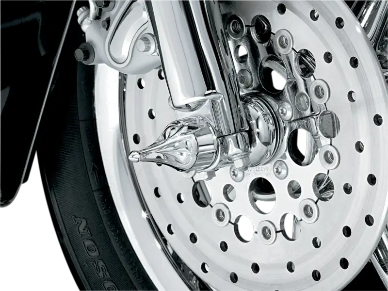 Chrome motorcycle front wheel with Kuryakyn Roman Axle Caps for style and protection