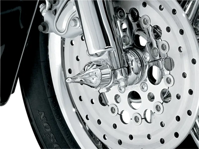 Chrome motorcycle front wheel with Kuryakyn Roman Axle Caps for style and protection
