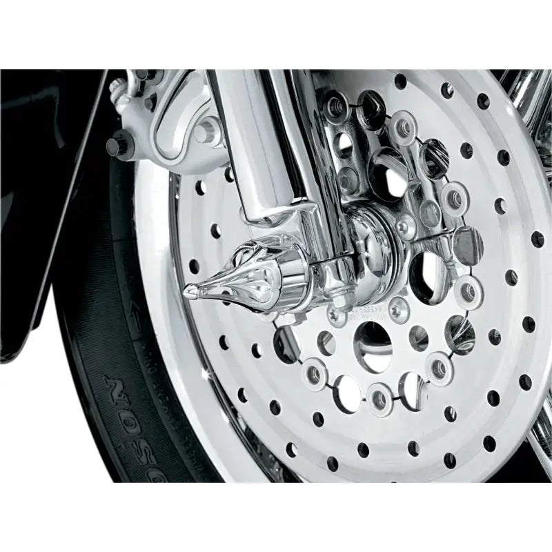 Chrome motorcycle front wheel with Kuryakyn Roman Axle Caps for style and protection