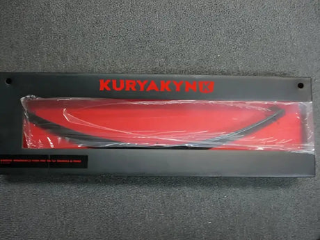 Black box with red interior and curved black trim, part of Kuryakyn Smooth Windshield Trim 96-13