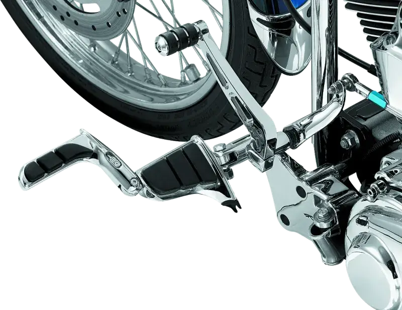 Kuryakyn Swingwing Peg with Male Mount Adapter in chrome installed on a motorcycle.