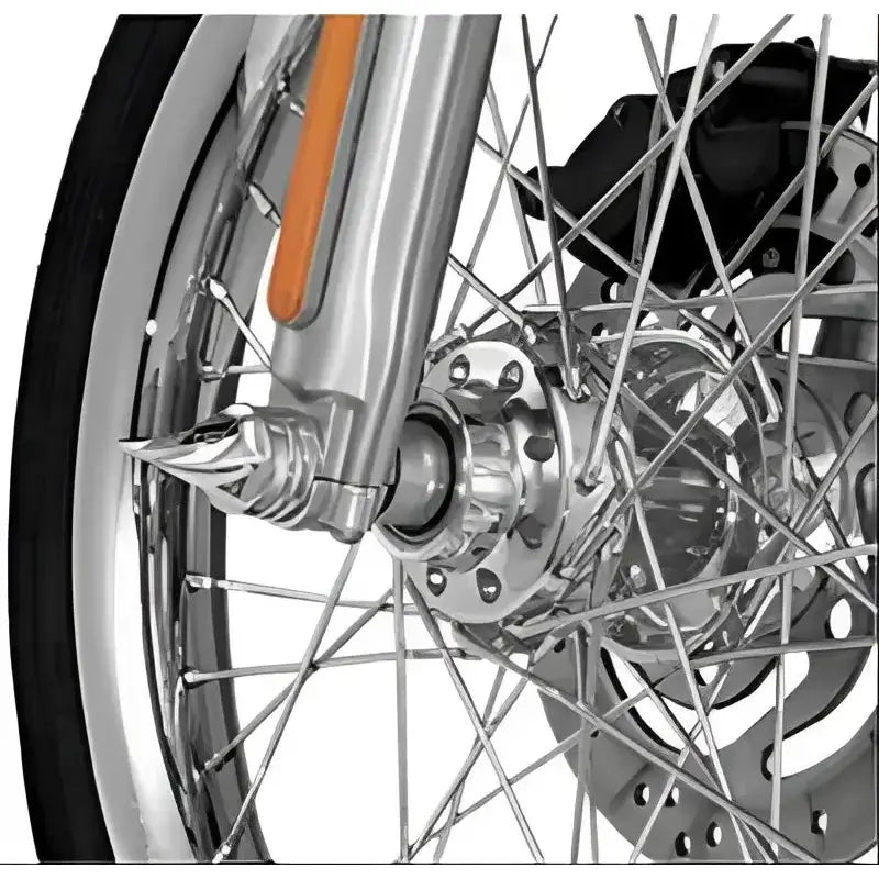 Chrome motorcycle front wheel with Kuryakyn Twisted Axle Caps and spiked nut cover