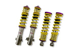 Four yellow and purple coilover shocks for Subaru Legacy coilover kit to boost driving experience