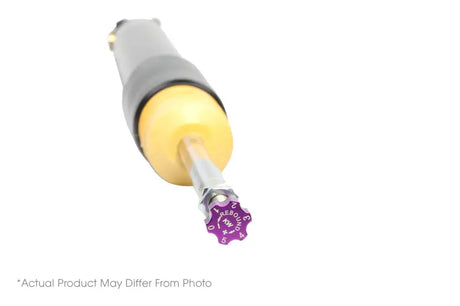 Purple rebound adjustment knob on shock absorber for Subaru Legacy coilover kit boosting your driving experience