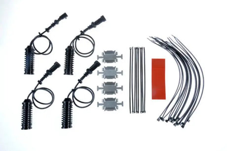 Automotive wiring harness kit for electronic damping cancellation in Chevrolet Corvette C5 C6