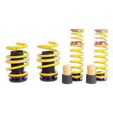 Yellow and purple coilover suspension kits for height adjustable ride height on Audi RS3