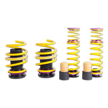 Yellow and purple coilover suspension kits for height adjustable ride height on Audi RS3