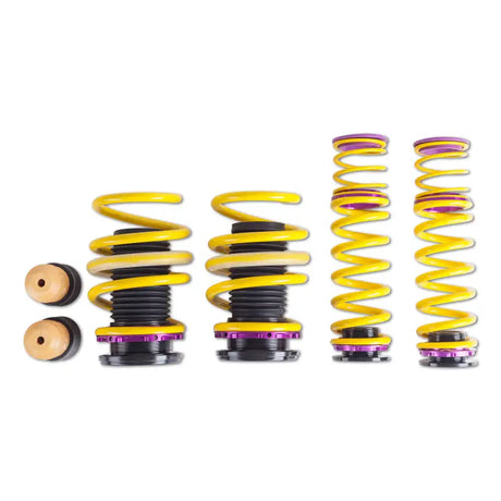Yellow and purple coilover suspension kits for adjustable ride height on Audi RS3 8V
