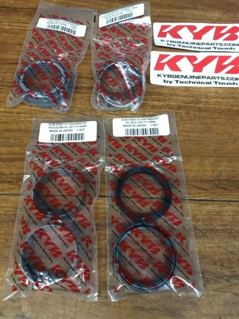 KYB 46mm piston fork oil seals in packaging for KYB 46mm piston bush replacement