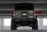 License Plate Relocation Kit Relocates To OEM Spare Tire Location Once Removed; Retains Light mount/ Back-up Camera