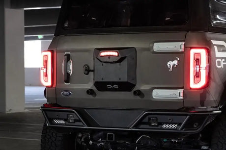 License Plate Relocation Kit Relocates To OEM Spare Tire Location Once Removed; Retains Light mount/ Back-up Camera