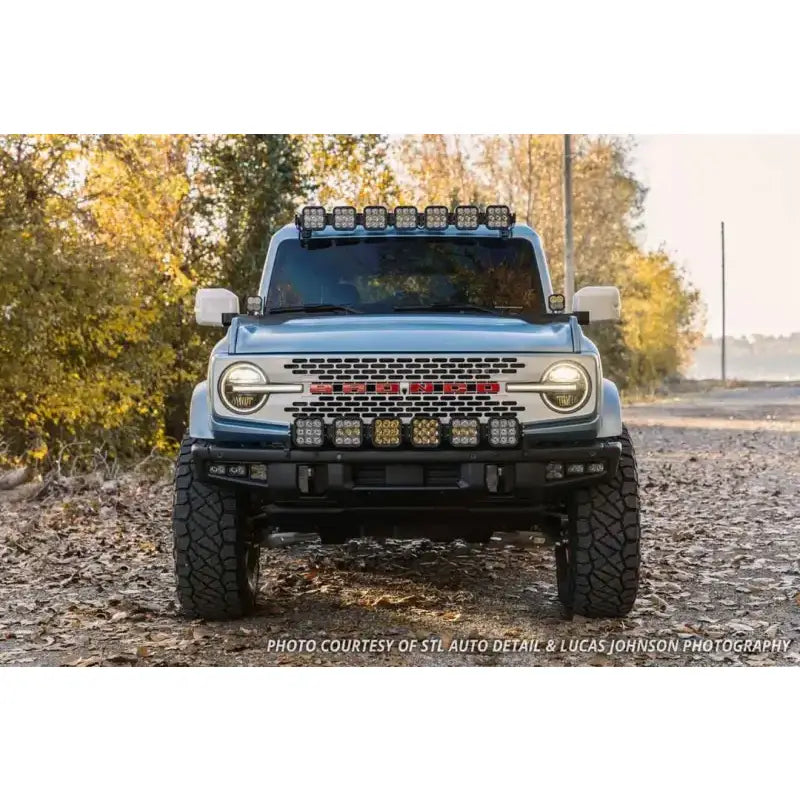 Blue Ford Bronco with aftermarket light bar LED bulb for extra brightness and style