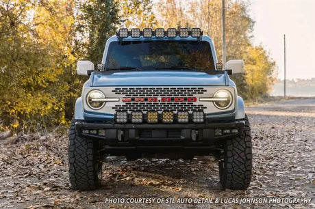 Blue Ford Bronco with aftermarket light bar LED bulb for extra brightness and style