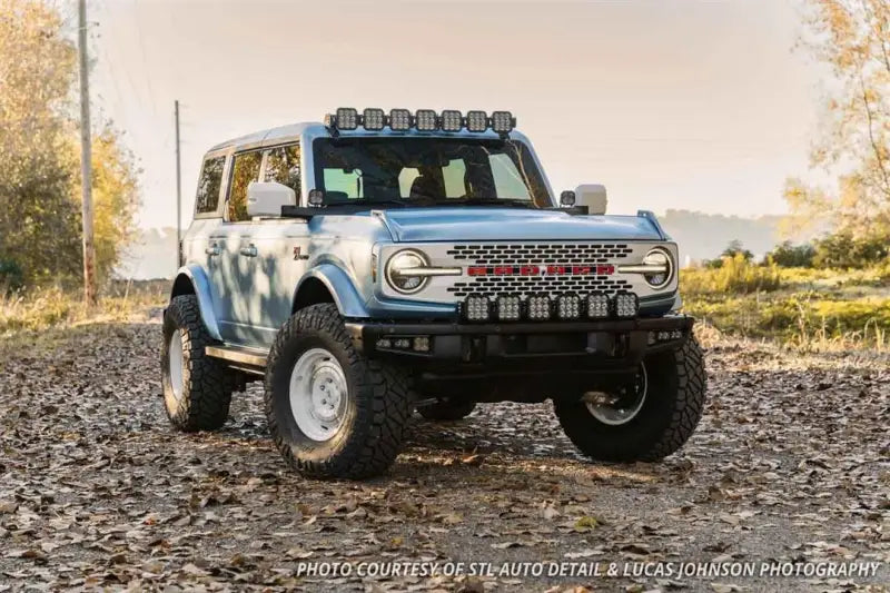 Customized light blue Ford Bronco with a 37.5 Inch Light Bar LED bulb for off-road driving