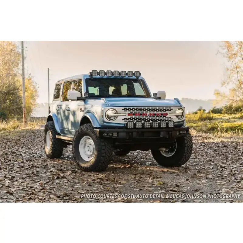 Customized light blue Ford Bronco with a 37.5 Inch Light Bar LED bulb for off-road driving