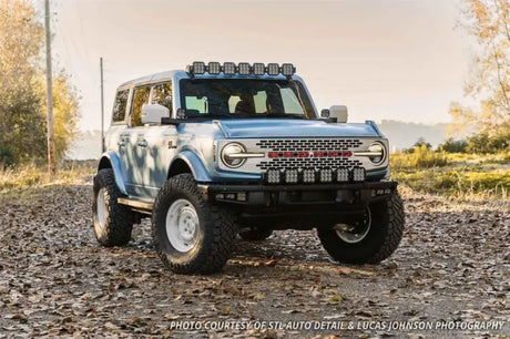 Customized light blue Ford Bronco with a 37.5 Inch Light Bar LED bulb for off-road driving