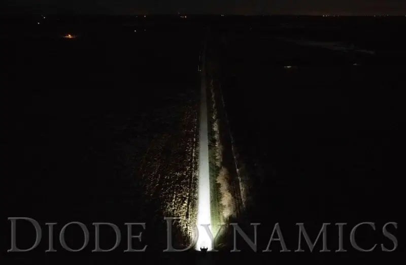 Brightly lit road at night with a powerful 37.5-inch light bar LED bulb installed