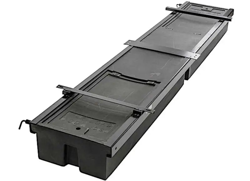 Lippert 236558 Under Chassis Storage System features a durable chassis-mounted rack with sliding storage boxes.