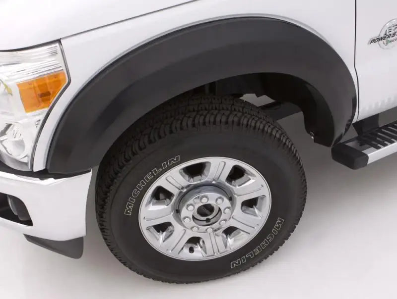 Truck tire with dodge ram ex-extrawide style textured black fender flares