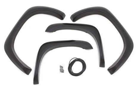 Black fender flare kit for Dodge Ram with ex-extrawide style from Lund Elite Series