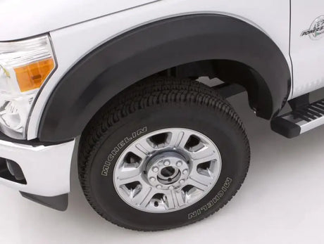 Truck tire next to dodge ram ex-extrawide style textured elite series fender flares