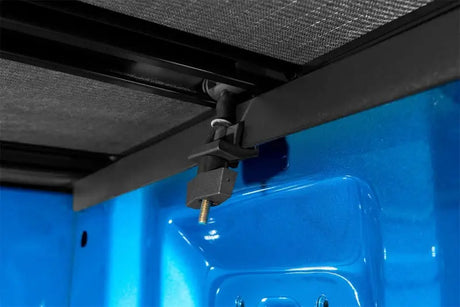 Black truck bed cover clamp for Genesis Elite Tri-Fold Tonneau Cover on Ford F-150