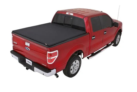 Red pickup truck with Genesis Elite Tri-Fold Tonneau Cover for Ford F-150
