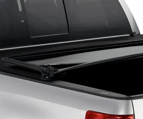 Genus Elite Tri-Fold Tonneau Cover on Ford F-150 truck bed for protection and style