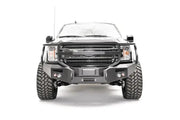 Black truck with heavy-duty grill guard from M3852-1 Fab Fours Ford Rap Adapt Rel Bracket