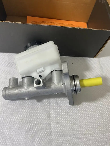 Silver M630808 Dorman master cylinder with white reservoir, meets OEM specs