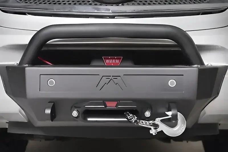 Black off-road bumper with winch and Fab Fours sensor plate for off-road protection
