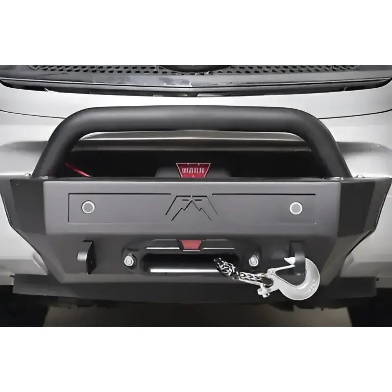 Black off-road bumper with winch and Fab Fours sensor plate for off-road protection