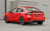 Red 2019 Honda Civic Sport hatchback with black accents and alloy wheels