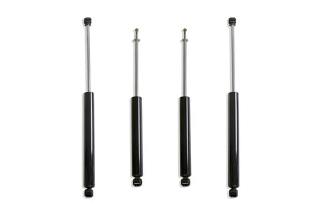 Four black shock absorbers for Ford F-250 F-350 4WD trucks MaxTrac shocks 943380S