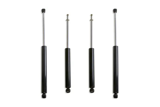 Four black shock absorbers for Ford F-250 F-350 4WD trucks MaxTrac shocks 943380S