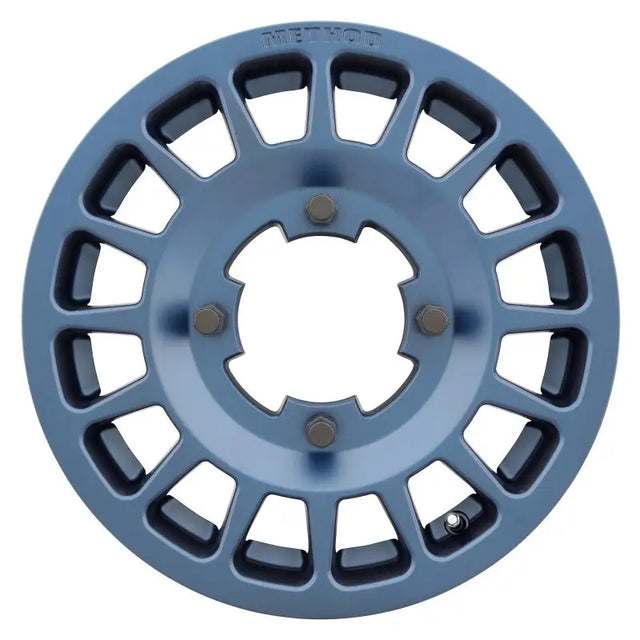 Blue metal Method MR407 Bead Grip wheel with geometric cutouts for Bahia Blue car upgrade