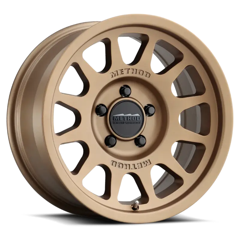 Bronze wheel showing off the method MR703 15x7 +15mm offset for off-road style