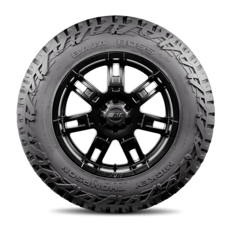 Mickey Thompson Baja Boss A/T Tire - LT285/55R20 showcasing its rugged all-terrain tread and durable construction, ideal for adventure enthusiasts and off-road lovers.