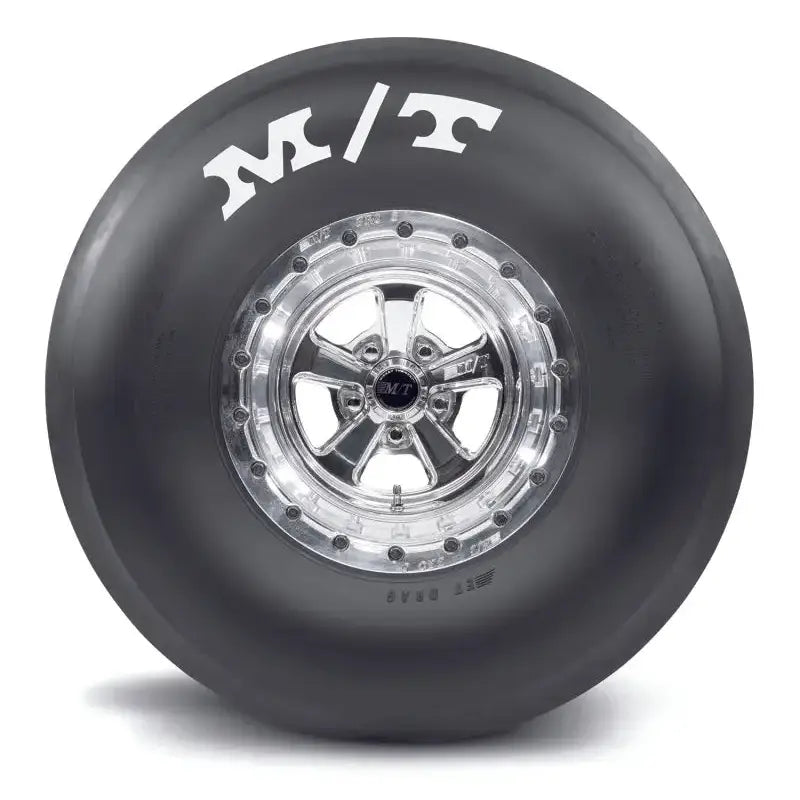 Mickey Thompson ET drag tire with black sidewall and silver rim