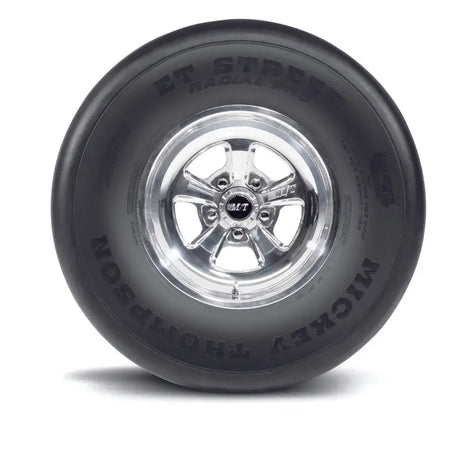 Mickey Thompson ET Street Radial Pro Tire - P275/60R15, black sidewall with bold lettering, mounted on a shiny chrome wheel.