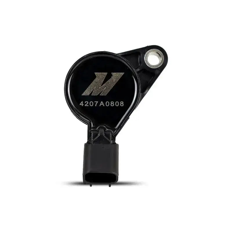 Black electronic component with mounting hole for Ford F150 eight cylinder ignition coil set