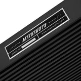 Black Mishimoto duramax intercooler kit for Chevrolet 6.6L Duramax engine upgrade