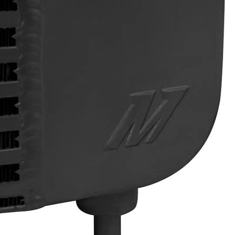 Black metal heat exchanger with embossed logo for Mishimoto Duramax intercooler kit
