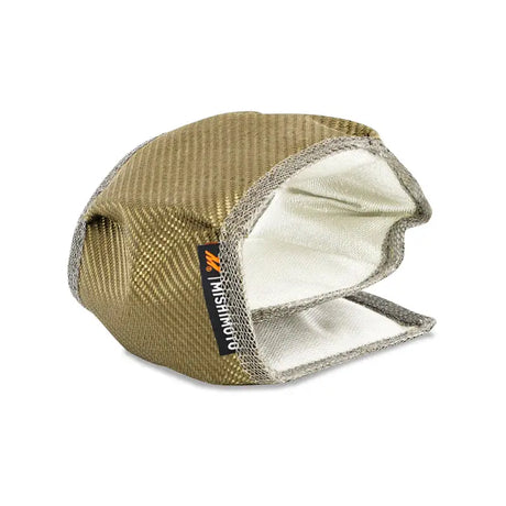 Gold and silver heat shield on Dodge Ram turbo blanket for engine bay protection