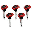 Five red and silver ignition coils from Mishimoto VW/Audi ignition coil set for five cylinders