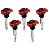 Five red and silver ignition coils from Mishimoto VW/Audi ignition coil set for five cylinders
